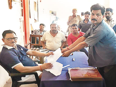 Druga beaten BJP leader in lockup