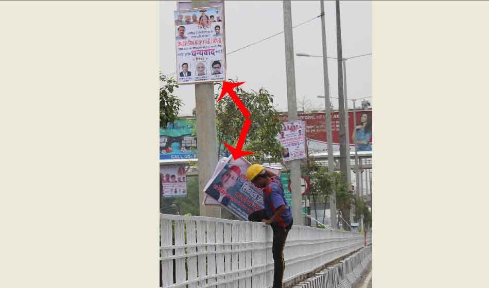 akhilesh yadav posters on elevated road that was inaugrated by yogi minister in noida