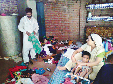 lakhs of material looted from three houses