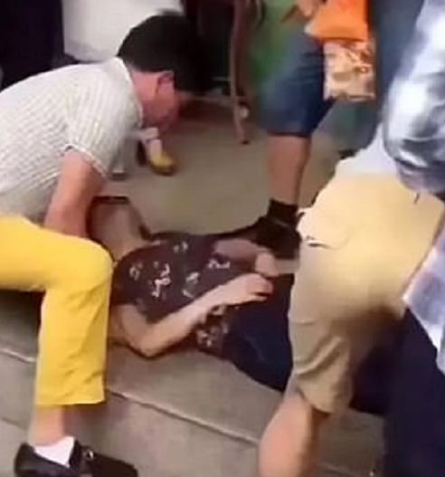 woman faints after accidently breaking  expensive jade bracelet 