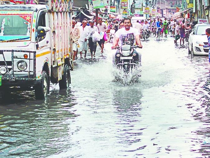Relief from heat, panic Water logging