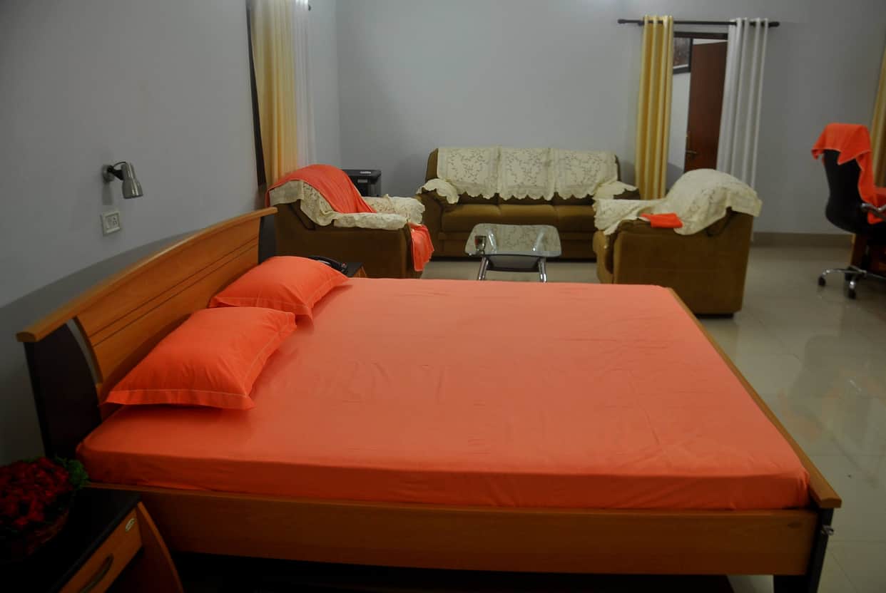 CM Yogi room, bedsheet, sofa cover in saffron color