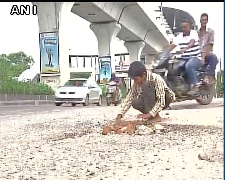 12-years-old takes it upon himself to fill potholes on habsiguda's main road hyderabad 