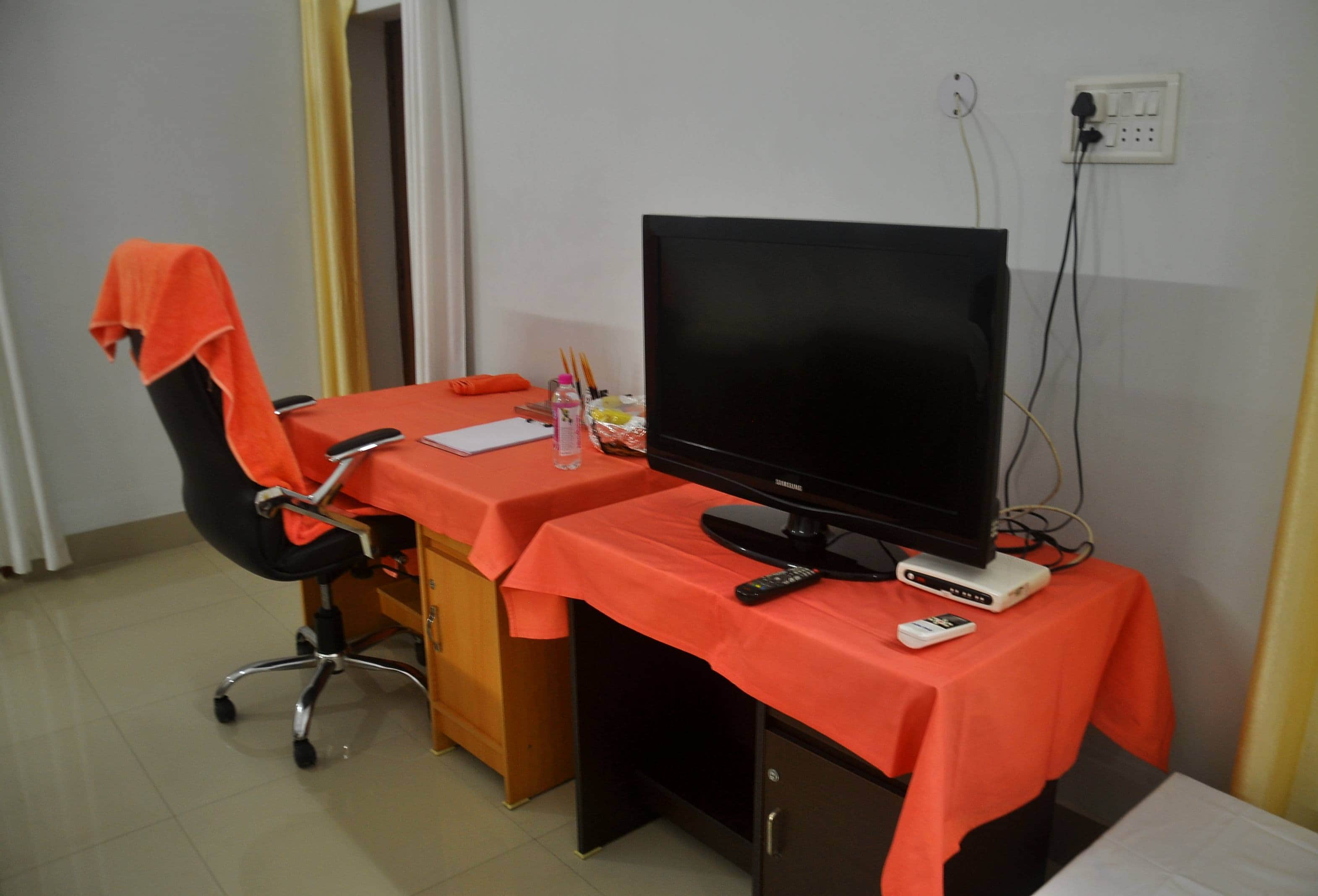 CM Yogi room, bedsheet, sofa cover in saffron color