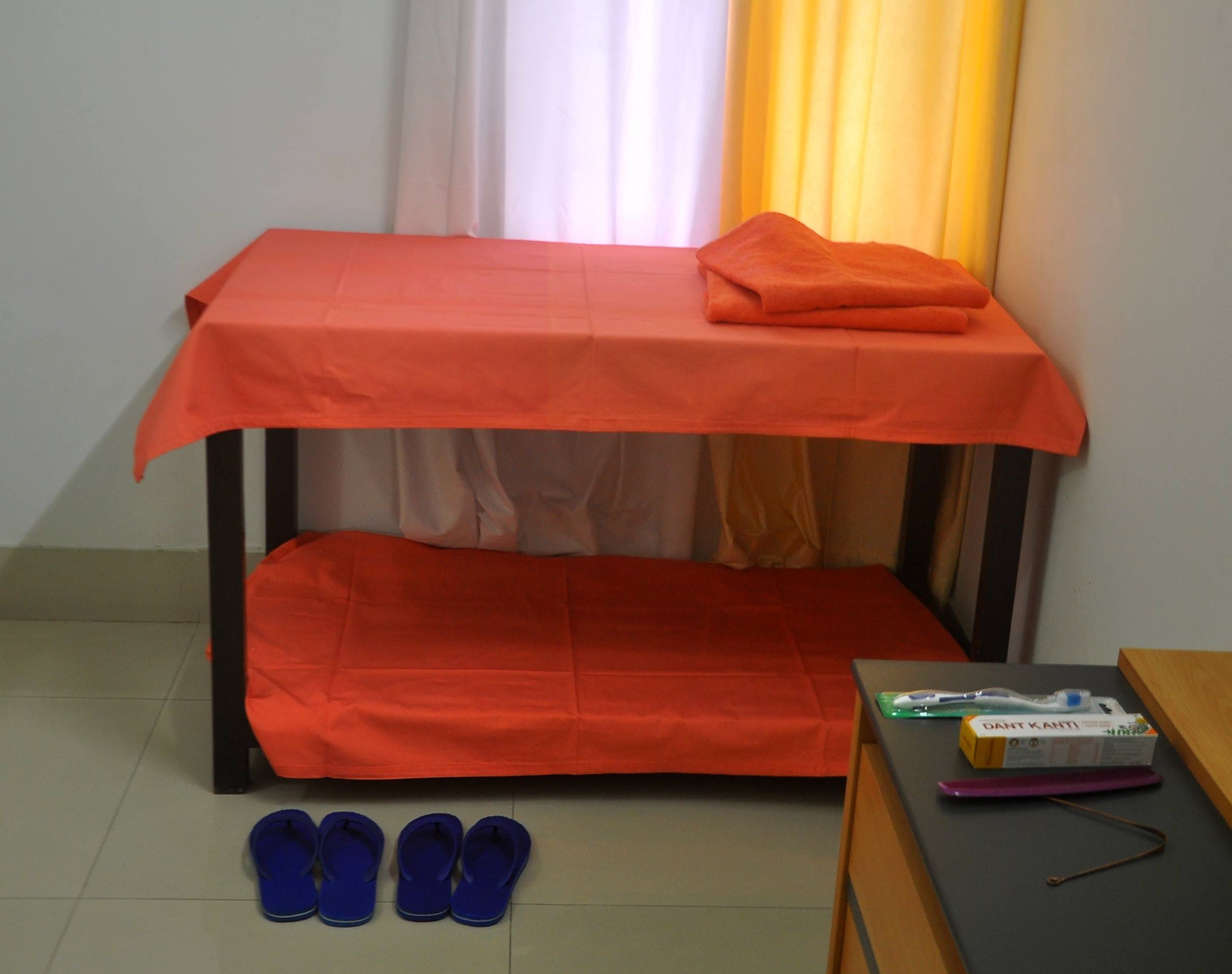 CM Yogi room, bedsheet, sofa cover in saffron color