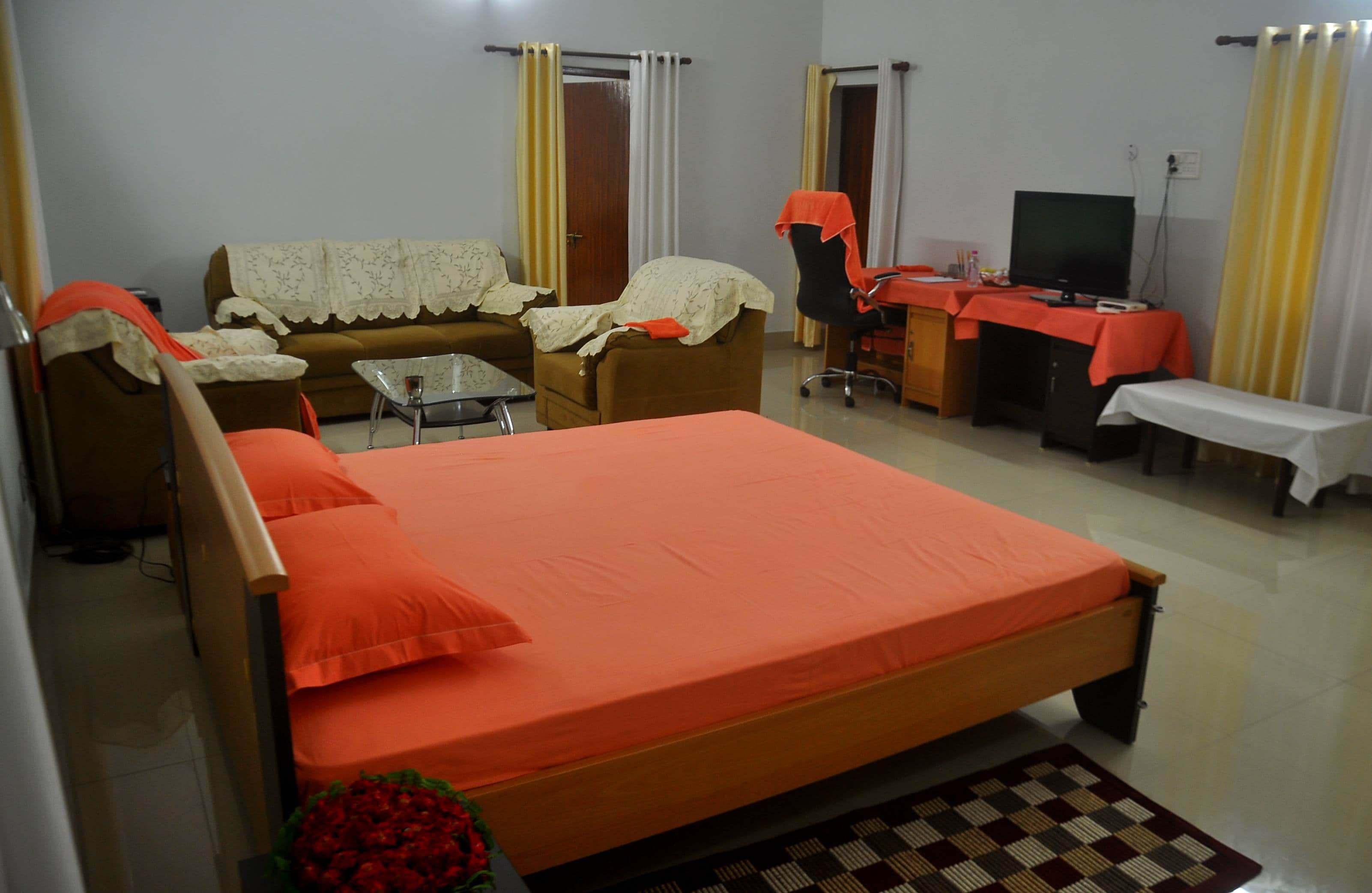 CM Yogi room, bedsheet, sofa cover in saffron color