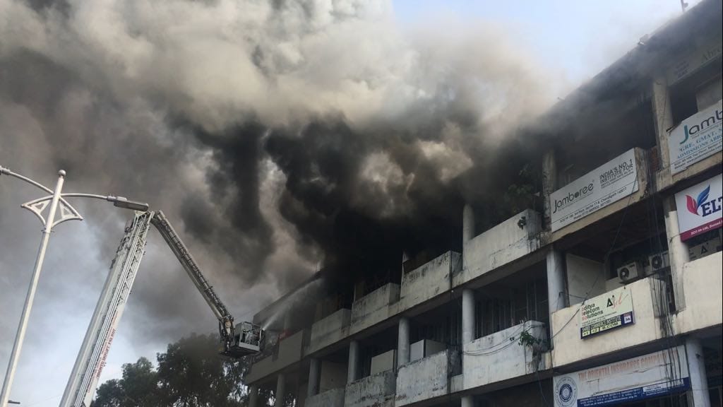 Fire breaks out at the top floor of Punjab Financial Corporation building