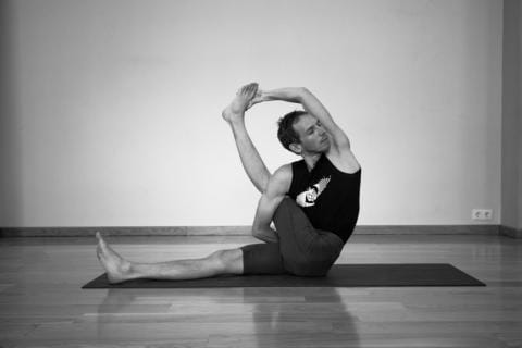 marichiasana reduces your spine and lower back pain