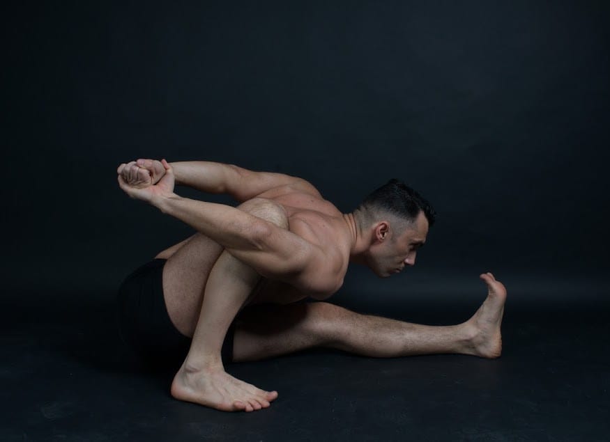 marichiasana reduces your spine and lower back pain