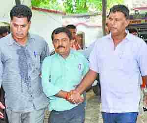 Officer caught taking bribe