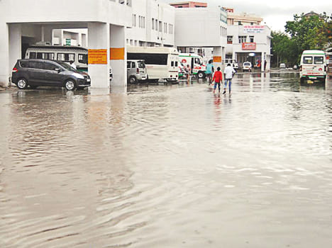 water logging on roads, bus stop at underbridge