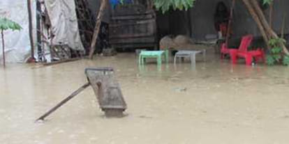 bus stop at underbridge due to water logging on roads
