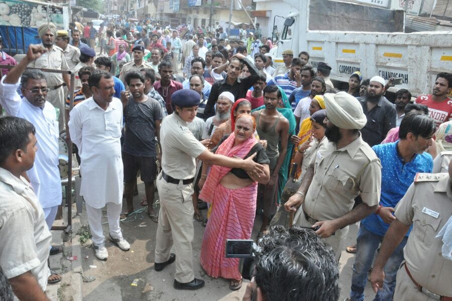 corporation runs JCB on 25 Houses in Indira colony