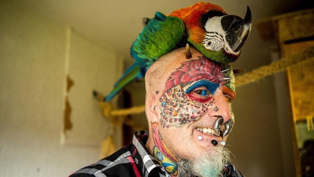 man cut his ears to look like parrot