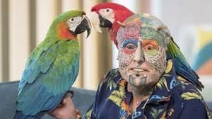 man cut his ears to look like parrot