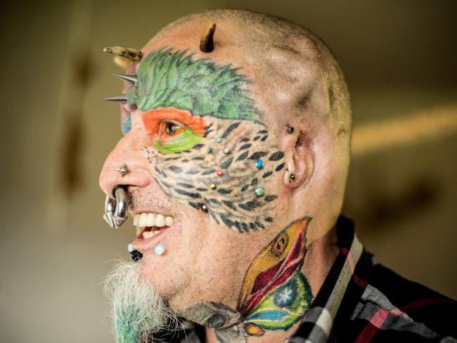 man cut his ears to look like parrot