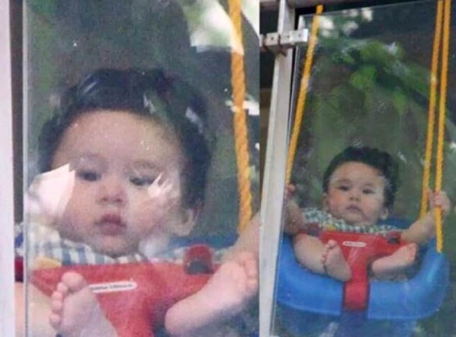 saif ali khan and kareena kapoor khan son taimur  enjoying on the swing