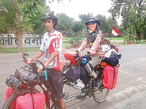 Navigator stealing from Indonesian couple's bicycle