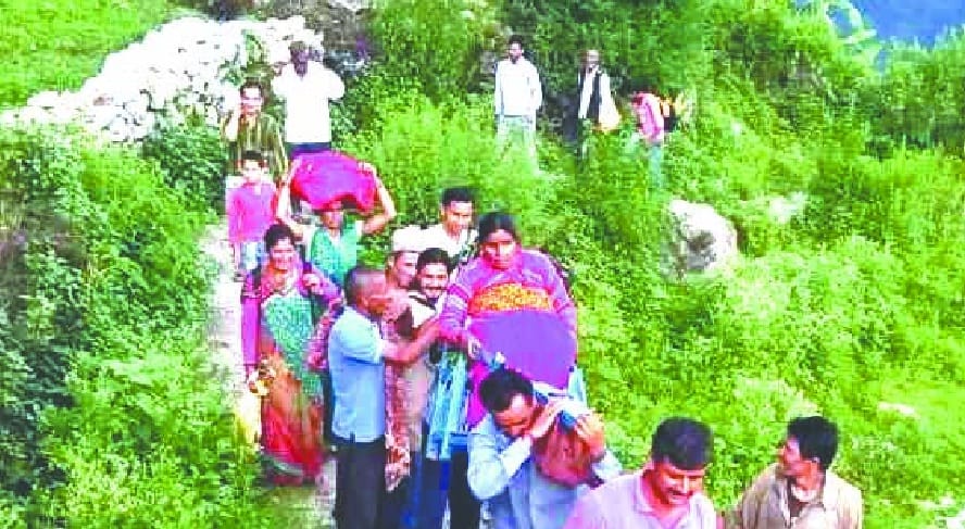 Seated six kilometers away from the wounded woman and sitting in the dolly