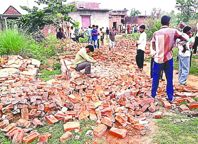 Two children, including daughter, fall from school wall collapse