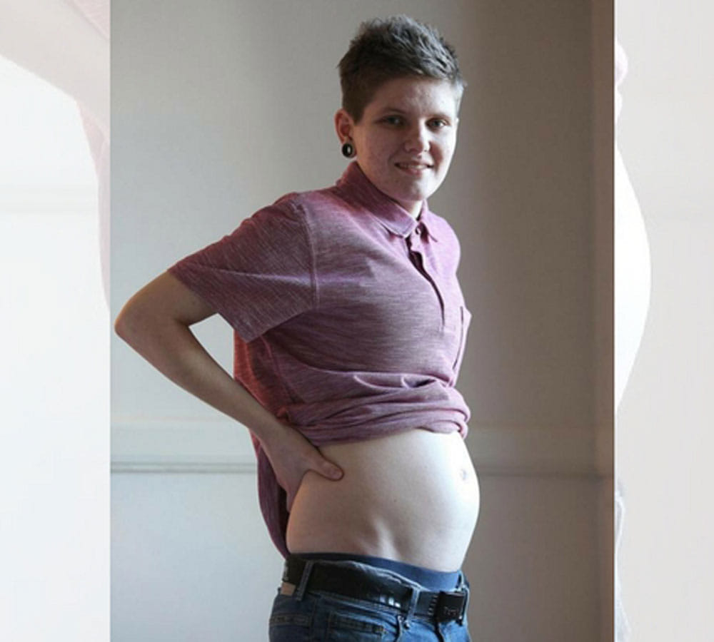   A 21 year old man has become the first in Britain to give birth baby girl