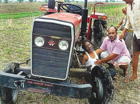 Broken line telegram dropped on tractor, scorching young man