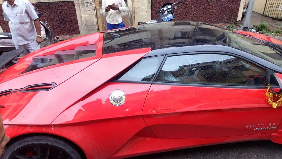 DC Avanti sports car passing through the streets of Varanasi, the queue for Selfie