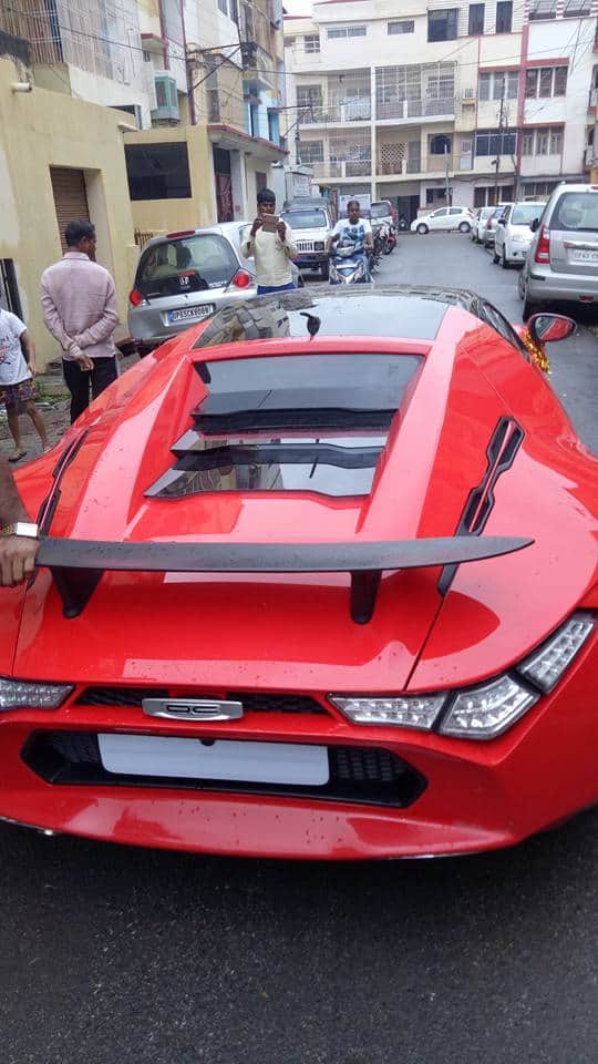 DC Avanti sports car passing through the streets of Varanasi, the queue for Selfie