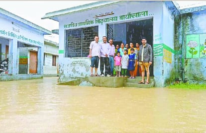 after heavy rain and water logging students and techers life in danger
