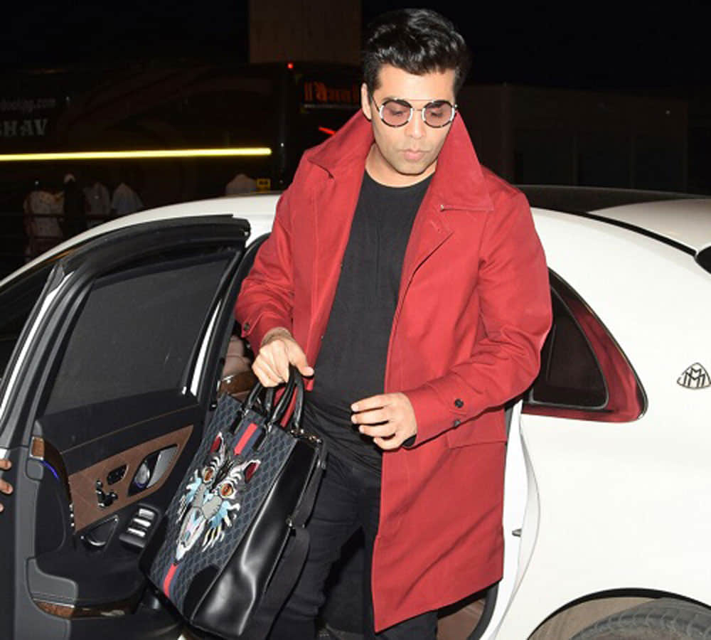 check out how expensive film maker Karan Johar bag 