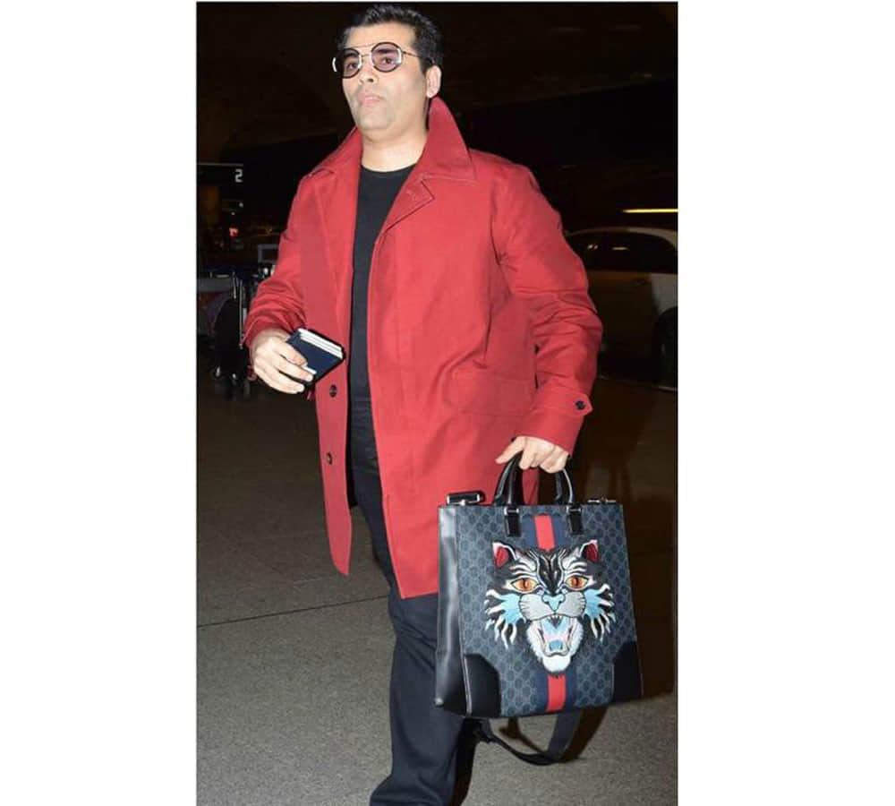 check out how expensive film maker Karan Johar bag 