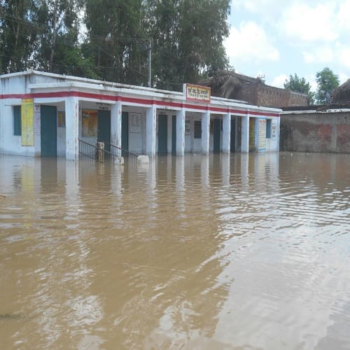 Rain havoc ... here students go to school by boat, view Photos