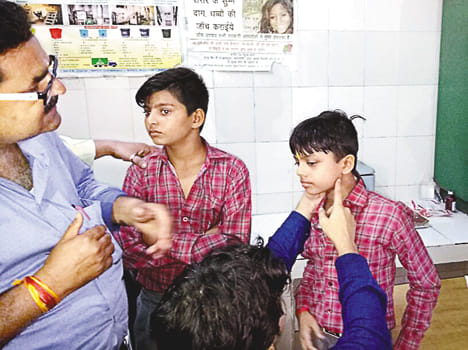 Parents enter school and beat children
