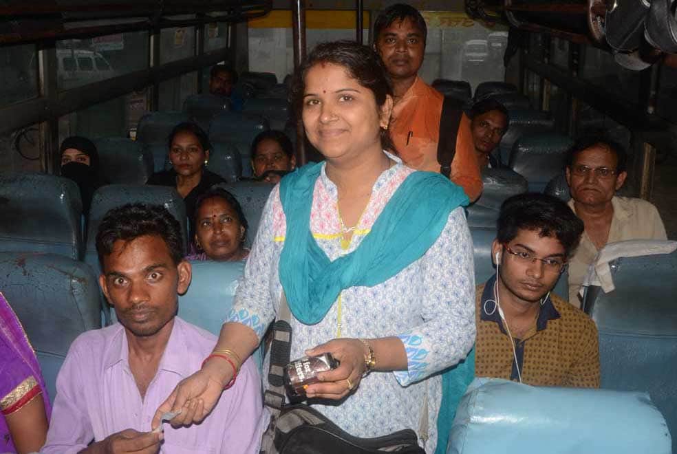 lady conductor in UP roadways bus