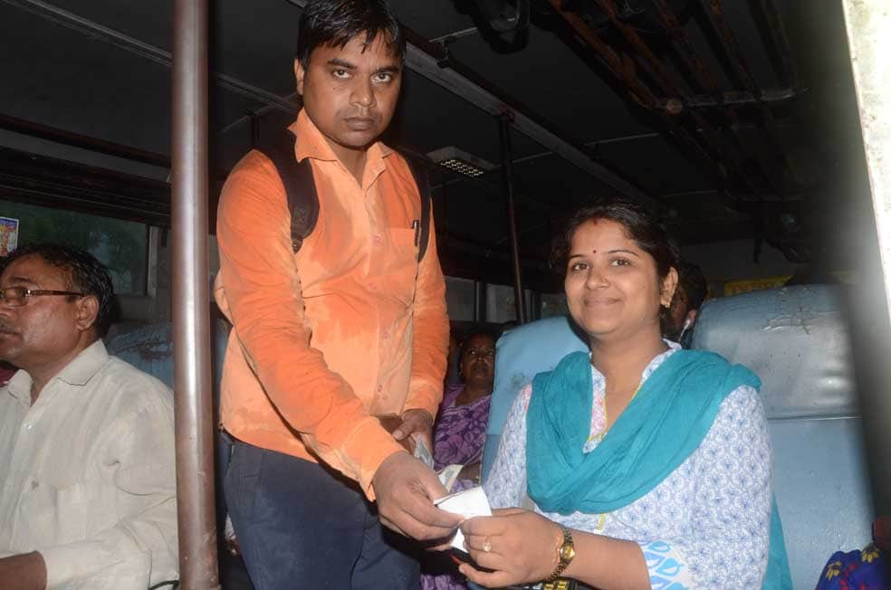 lady conductor in UP roadways bus