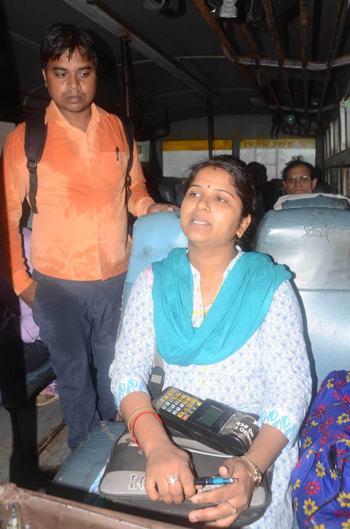 lady conductor in UP roadways bus