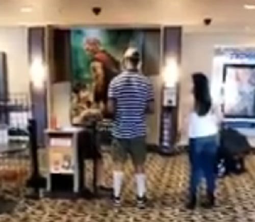 Watch how couple smuggles chips and cold drinks in a   cinema hall using this trick