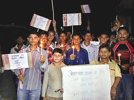 Candle march removed tribute