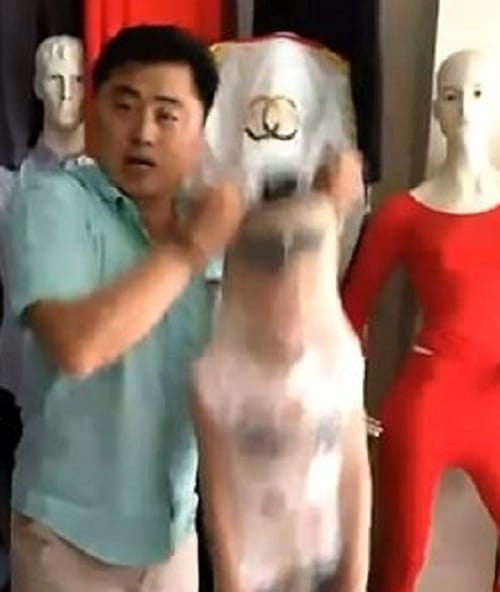 Chinese man gives hillarious demonstration of pantyhose tights by stuffing his son in it