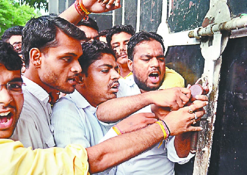 abvp protest in front of school