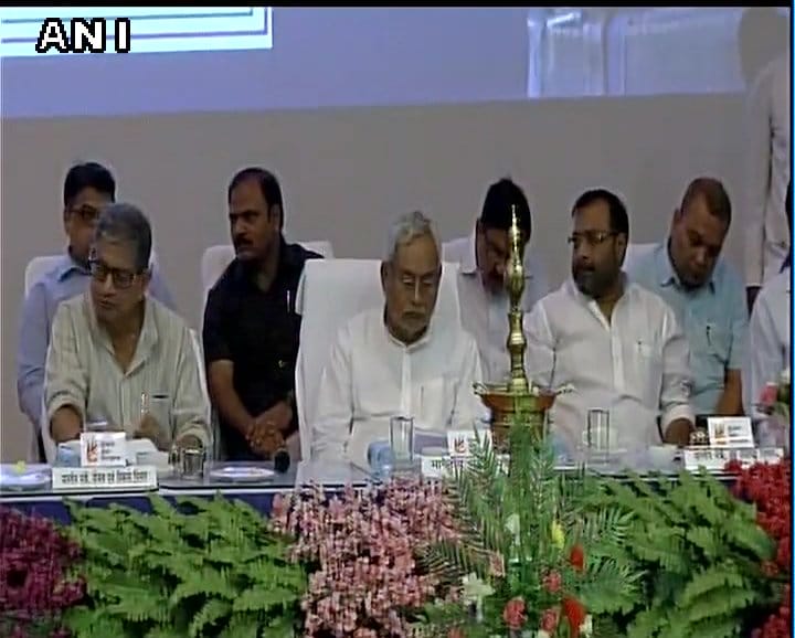 Nitish kumar sitting on a stunning chair 