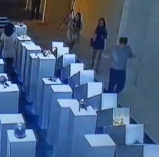 Women breaks art worth crores while taking selfie a 14th factory exhibition in the USA