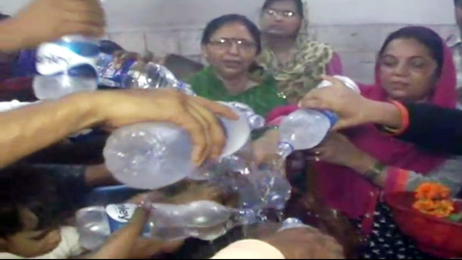 Worship of Shiva with mineral water