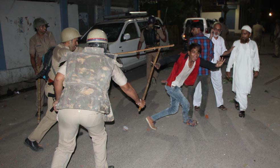 varanasi heavy chaos in two community for cow dispute