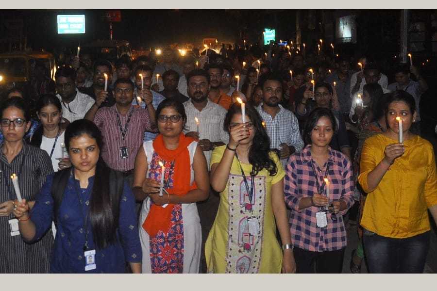  TCS employees candle march in Lucknow.
