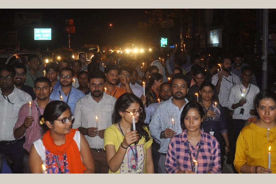  TCS employees candle march in Lucknow.