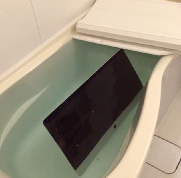 heartbroken girlfriend trashed partner collection of   Apple gadgets in the bath tub as a revenge