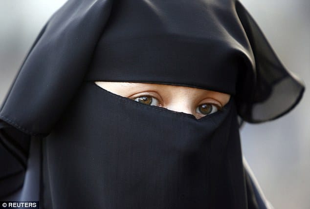 German judge said to Syrian woman, must remove her Islamic headscarf during divorce hearing in court