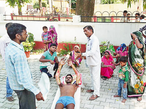 Workers lit up fellow in medical college