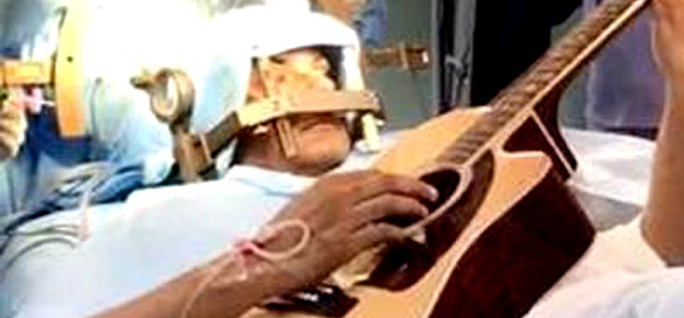  Guitar playing young man during brain surgery